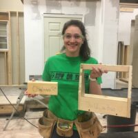 Chelsea with her work at the woodworking class