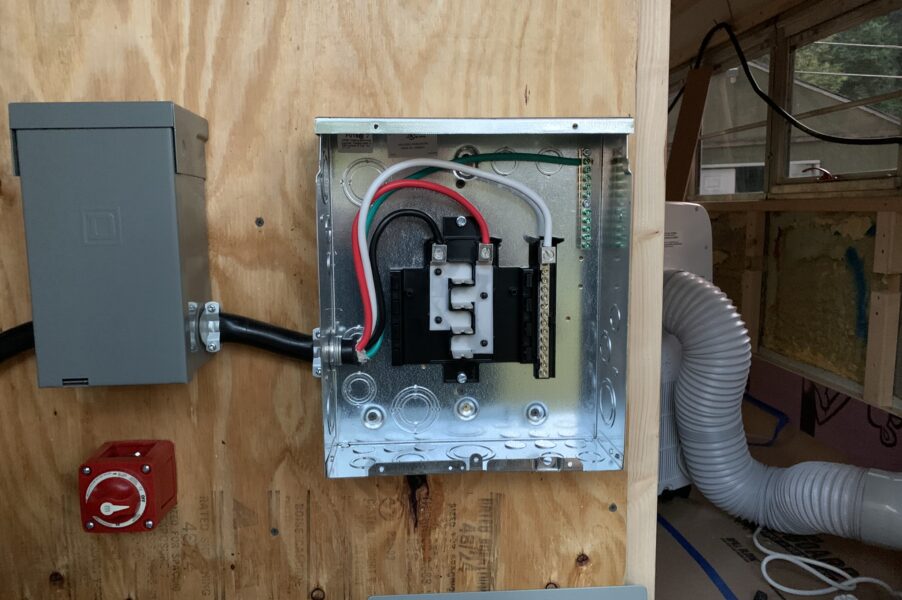 a spa panel and a main electrical panel wired